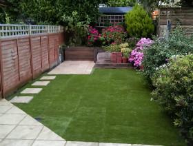Fake turf and patio installation.